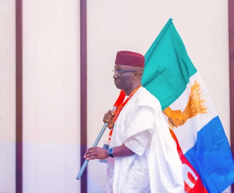 Monday-Okpebholo-with-the-APC-flag